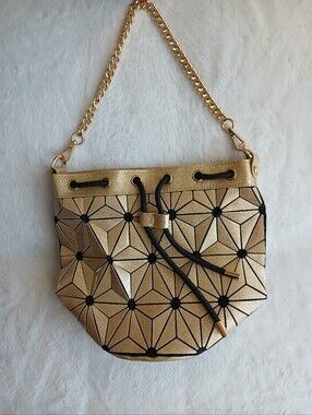 Gold Paneled Drawstring Geometric Flash Purse with chain strap Unused